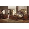 Classic Ornate Brown Wood Bed with Tufted Headboard