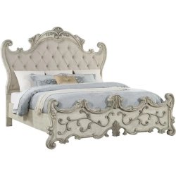 Ornate Carved Panel Bed with Upholstered Headboard