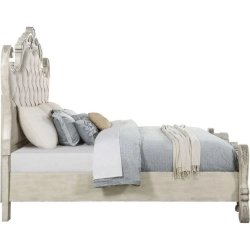 Ornate Carved Panel Bed with Upholstered Headboard