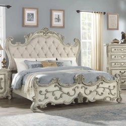 Ornate Carved Panel Bed with Upholstered Headboard