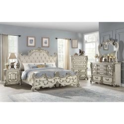 Ornate Carved Panel Bed with Upholstered Headboard