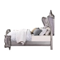 Elegant Upholstered Tufted Bed with Ornate Carving