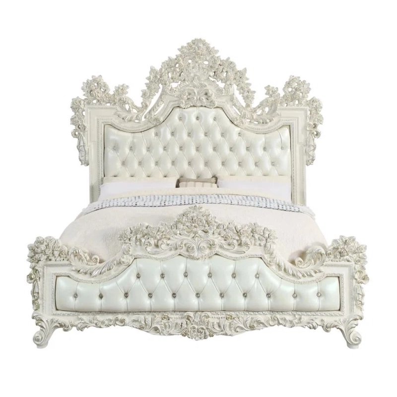 Luxurious Ornate White Tufted Bed with Detailed Carvings
