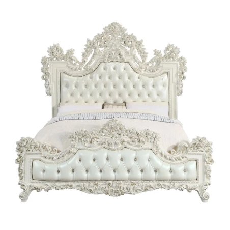 Luxurious Ornate White Tufted Bed with Detailed Carvings