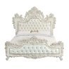 Luxurious Ornate White Tufted Bed with Detailed Carvings