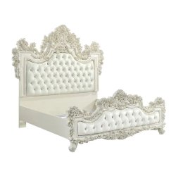 Luxurious Ornate White Tufted Bed with Detailed Carvings