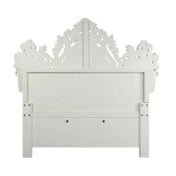 Luxurious Ornate White Tufted Bed with Detailed Carvings