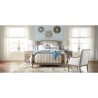 Classic Beige Upholstered Platform Bed with Dark Wood Frame