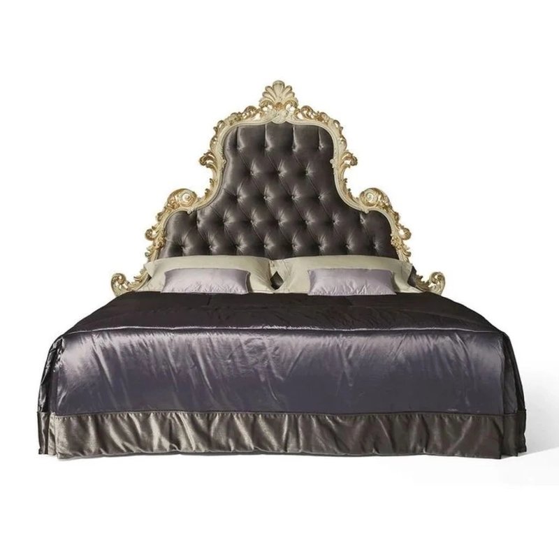Luxurious Tufted Headboard Bed with Ornate Gold Trim Luxurious Tufted Headboard Bed with Ornate Gold Trim