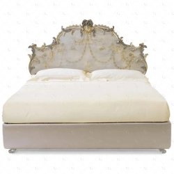 Elegant Carved Wood Bed with Ornate Headboard