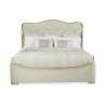 Elegant Upholstered Bed with Curved Headboard and Decorative Trim