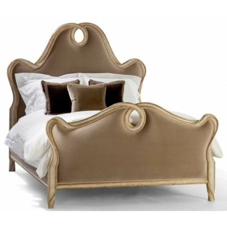 Elegant Upholstered Bed with Ornate Wood Frame