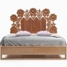 Elegant Hand-Carved Wooden Bed with Floral Headboard
