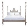 Elegant Carved Wood Four Poster Bed with Ornate Headboard