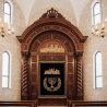 Premium handcrafted Aron Kodesh, masterfully carved wood synagogue furniture with gold velvet parochet.