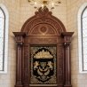 Premier hand-carved wooden Aron Kodesh with embroidered Parochet, manufactured for lasting beauty in synagogues.