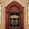 Artisan-crafted wooden Aron Kodesh for synagogues, featuring exquisite carvings and embroidered curtain.