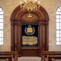 Premium Aron Kodesh: Hand-carved wood synagogue furniture by expert manufacturers, a symbol of enduring tradition and quality.