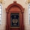 Premium Aron Kodesh: Handcrafted wood, deep blue velvet, golden lion embroidery. Exemplary manufacturing for synagogues.