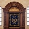 Finely crafted Aron Kodesh, showcasing intricate wood carving and sacred design, ideal for synagogue interiors.