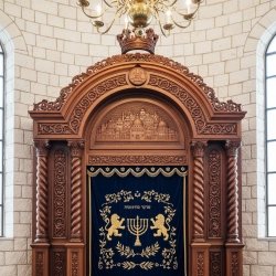 Grand Aron Kodesh: Superior Hardwood Craftsmanship & Embroidered Velvet Parochet, by [Your Company Name]