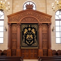 Exquisite Hand-Carved Hardwood Aron Kodesh with Velvet & Gold Embroidery by a Leading Furniture Manufacturer.