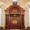 Exquisitely manufactured Aron Kodesh, featuring premium wood and ornate embroidery, perfect for synagogue sanctuaries.