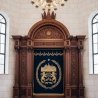 Exquisite Aron Kodesh: Artisanal Carved Woodwork with Luxurious Embroidered Velvet Curtain for Synagogue Sanctuary.