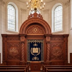 Aron Kodesh: Hand-carved solid wood, golden Menorah, premium synagogue furniture.