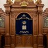 A realistic image of Mahogany Wood Aron Kodesh, Torah Ark hand carvings, image generated by Gemini-2.5-Flash.