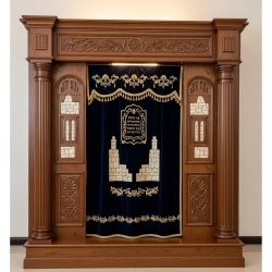 A realistic image of Mahogany Wood Aron Kodesh, Torah Ark hand carvings, image generated by Gemini-2.5-Flash.