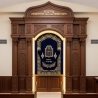 A realistic image of Mahogany Wood Aron Kodesh, Torah Ark hand carvings, image generated by Gemini-2.5-Flash.