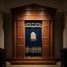 A realistic image of Mahogany Wood Aron Kodesh, Torah Ark hand carvings, image generated by Gemini-2.5-Flash.