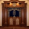 A realistic image of Mahogany Wood Aron Kodesh, Torah Ark hand carvings, image generated by Gemini-2.5-Flash.