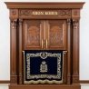 A realistic image of Mahogany Wood Aron Kodesh, Torah Ark hand carvings, image generated by Gemini-2.5-Flash.