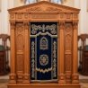 A realistic image of Mahogany Wood Aron Kodesh, Torah Ark hand carvings, image generated by Gemini-2.5-Flash.