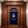 A realistic image of Mahogany Wood Aron Kodesh, Torah Ark hand carvings, image generated by Gemini-2.5-Flash.