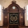 A realistic image of a handcrafted mahogany Aron Kodesh designed by Mulyoharjo Furniture, image generated by Gemini-2.5-Flash.