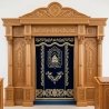 A realistic image of Mahogany Wood Aron Kodesh, Torah Ark hand carvings, image generated by Gemini-2.5-Flash.