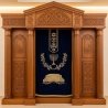 A realistic image of Mahogany Wood Aron Kodesh, Torah Ark hand carvings, image generated by Gemini-2.5-Flash.