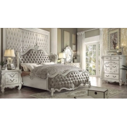 Classic painted bed with intricate carved patterns Mulyoharjo Furniture Vila