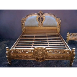 Classic carved bed with hand-painted accents Mulyoharjo Furniture Hospitality