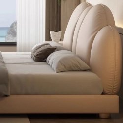 Elegant Upholstered Bed with Curved Headboard, Contemporary Design