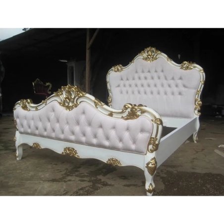 Classic Carved White Bed Frame with Tufted Pink Upholstery and Gold Accents