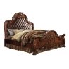 Classic Traditional Carved Wood Bed with Tufted Leather Headboard