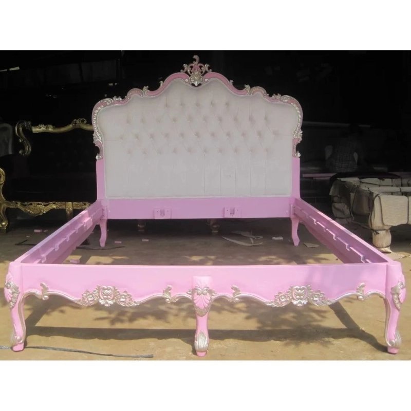 Opulent Pink Upholstered Wooden Bed Frame with Ornate Carvings Opulent Pink Upholstered Wooden Bed Frame with Ornate Carvings