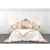 Classic Luxurious Upholstered Bed with Ornate Gold Headboard and Nightstands